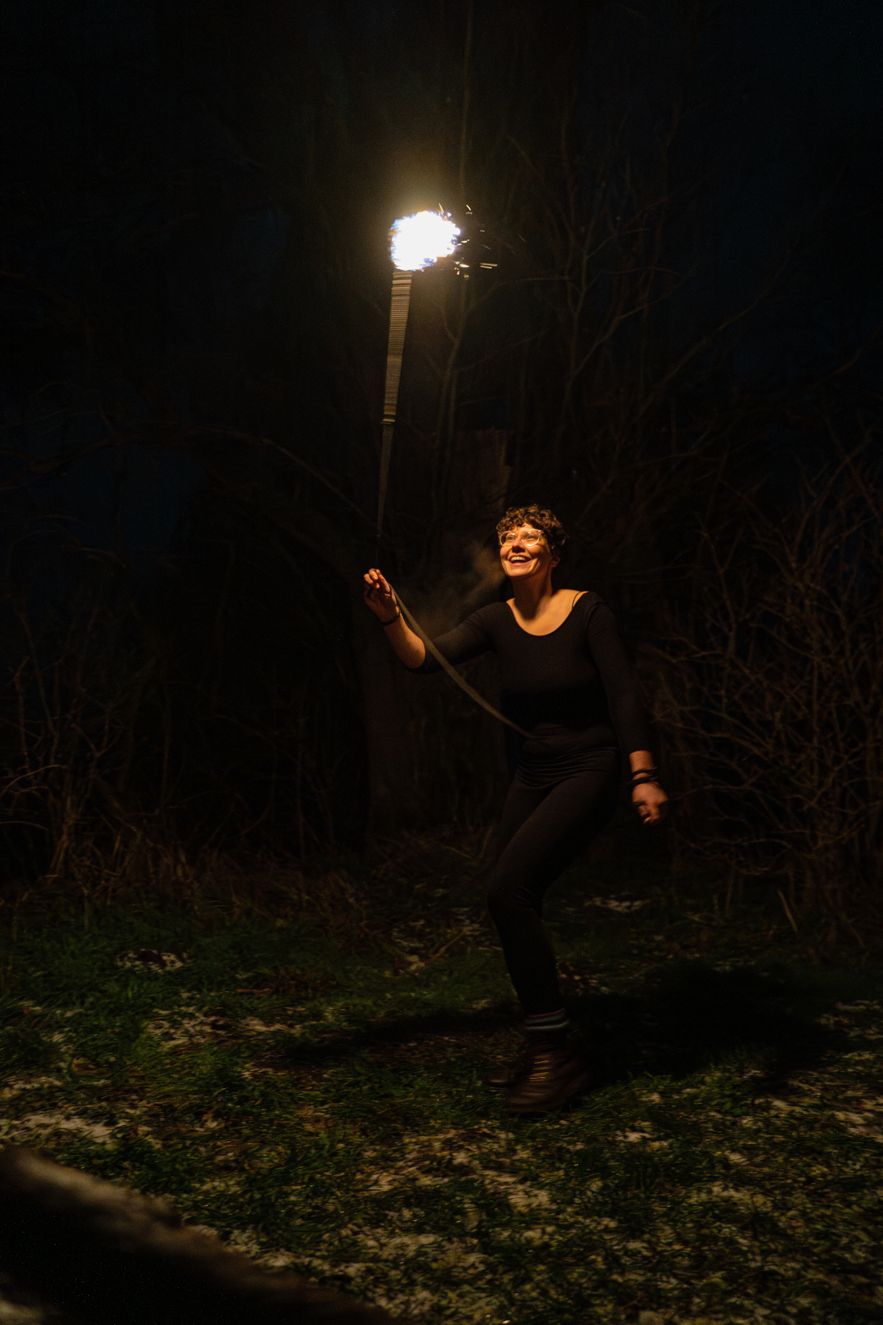 Rope Dart Feuershow bei Nacht